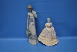 A COALPORT FIGURINE 