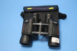 A PAIR OF CELESTRON BINOCULARS