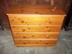 A SOLID PINE FOUR DRAW CHEST