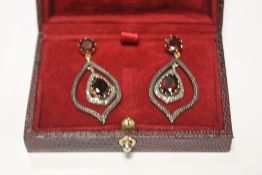 A PAIR OF DROP EARRINGS STAMPED 585 AND 925 SET WITH GARNETS AND DIAMONDS, BOXED