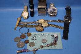 A COLLECTION OF WRIST WATCHES, SMALL QUANTITY OF COINS, SILVER CHARM BRACELET ETC.