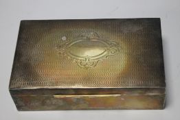 A HALLMARKED SILVER BOX WITH TORTOISESHELL TYPE BASE