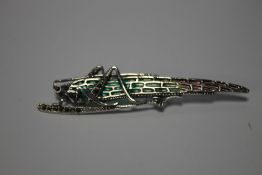 A LARGE SILVER PLIQUE-A-JOUR LOCUST BROOCH SET WITH CABOCHON, RUBY AND MARCASITE