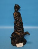 A BRONZED STYLE FIGURING OF A LADY WITH DOG