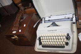 A SCHEIDEGGER TYPOMATIC TMS TYPEWRITER MADE IN WESTERN GERMANY TOGETHER WITH A JONES BOOT POLISH