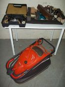 A FLYMO MOWER AND A SELECTION OF TOOLS