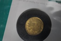 A VICTORIAN 1854 SHIELD BACK SOVEREIGN IN ROYAL MINT COLLECTORS SERVICES PACKET.