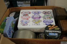 A BOX OF COLLECTABLE TINS TOGETHER WITH A GOLDEN SHRED PAPER BAG CONTAINING CHARACTER LABELS,