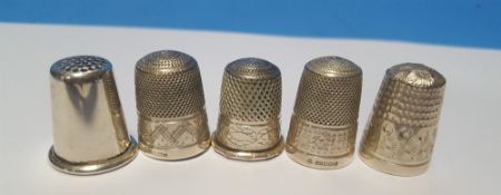 FIVE HALLMARKED SILVER THIMBLES