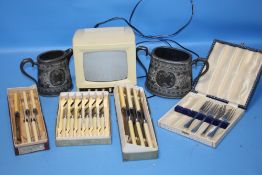 A QUANTITY OF BOXED KNIVES, A PORTABLE TV ETC.