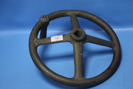 A BRASS/BRONZE FOUR SPOKE FLY WHEEL POSSIBLY FROM A WWI ARTILLERY PIECE D 30.5 cm