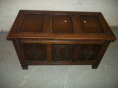 AN OAK PANNELLED BLANKET CHEST COFFER