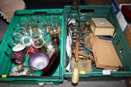 A TRAY OF METALWARE TO INCLUDE CANDLESTICKS TOGETHER WITH A TRAY OF GLASSWARE