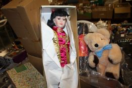 A COLLECTION OF BOXED DOLLS, SOFT TOYS ETC.