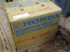 A HONDA PORTABLE GENERATOR E300