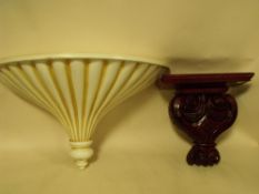 A LARGE RESIN FAN SHAPED CORBEL/ SHELF, WIDTH 59 CM TOGETHER WITH A SMALLER EXAMPLE