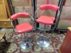 TWO RETRO STYLE RED BAR STOOLS