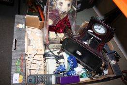 A TRAY OF COLLECTABLES TO INCLUDE TELEPHONES, MEERKAT TOY ETC.