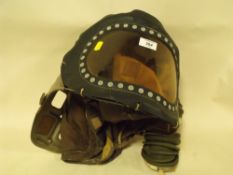 A WORLD WAR II ERA CHILD'S GAS MASK