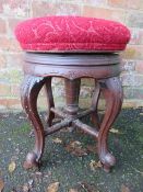 AN EDWARDIAN MAHOGANY CIRCULAR RISE-UP PIANO STOOL