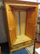 A PINE DOUBLE WARDROBE WITH 2 DRAWERS BELOW H 199 CM W 140 CM