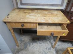 AN ANTIQUE PINE TWO DRAWER WASHSTAND W 91 CM