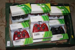 A TRAY OF BOXED CONTROLLERS