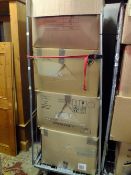 A CAGE OF MIXED ITEMS TO INCLUDE MOSTLY PHONE CASES AND SCREEN PROTECTORS