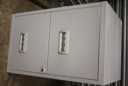 A TWO DRAWER FILING CABINET