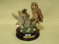 A LIMITED EDITION COUNTRY ARTISTS HERALD OF SPRING OWL FIGURE GROUP