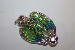 A STERLING SILVER PLIQUE DE JOUR BROOCH IN THE FORM OF A BIRD OF PREY