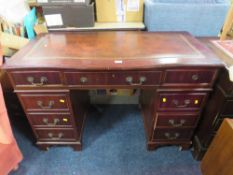A REPRODUCTION MAHOGANY TWIN PEDESTAL LEATHER TOPPED DESK H-77 W-121 CM