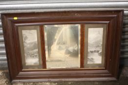 A VINTAGE MAHOGANY FRAMED MIRROR FLANKED BY BLACK AND WHITE PRINTS - OVERALL SIZE - 96CM X 63CM