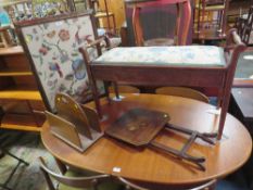 A VINTAGE OAK FRAMED FIRESCREEN INLAID FOLDING TABLE, A SMALL MAGAZINE RACK AND DUET PIANO STOOL (