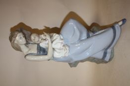 A LARGE NAO FIGURE OF A WOMAN AND CHILD, H 38CM