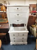 TWO SMALL MODERN WHITE PAINTED CHEST OF DRAWERS (2)