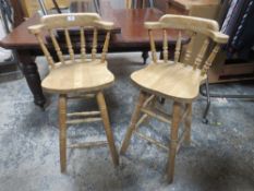A PAIR OF MODERN LOW PINE BAR STOOLS