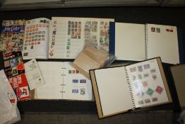A QUANTITY OF STAMP ALBUMS