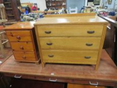 A LIGHT OAK 3 DRAWER CHEST AND A PINE BEDSIDE CHEST (3)