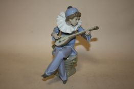 A NAO FIGURE OF A BOY PLAYING LUTE