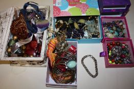 FOUR SMALL BOXES OF COSTUME JEWELLERY TO INCLUDE A SILVER BRACELET