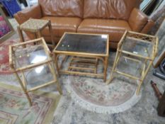 A CANE OCCASIONAL GLASS TOP TABLE, 2 SIMILAR BEDSIDE TABLES AND A RETRO STOOL (4)