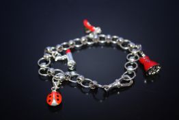 A MODERN STERLING SILVER CHARM BRACELET, 15.7G