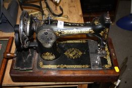 A VINTAGE SINGER SEWING MACHINE