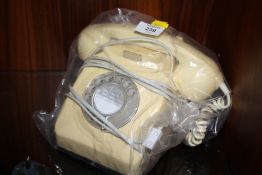 A VINTAGE CREAM TELEPHONE