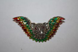 A STERLING SILVER PLIQUE DE JOUR BROOCH IN THE FORM OF AN OWL IN FLIGHT