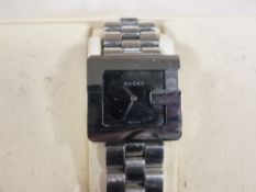 A BOXED GENTS GUCCI G WATCH WITH PAPERWORK, A/F