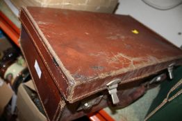 A VINTAGE BRIEFCASE CONTAINING MECCANO AND VINTAGE AUTO CAR MAGAZINES