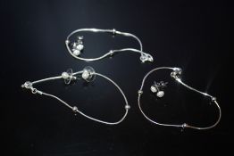 THREE PAIRS OF STERLING SILVER EARRINGS AND THREE SILVER BRACELETS TOTAL WEIGHT 8.7 G