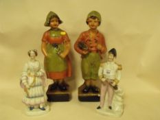 A PAIR OF STAFFORDSHIRE STYLE FIGURES OF SIR JOHN FRANKLIN AND LADY FRANKLIN TOGETHER WITH A PAIR OF